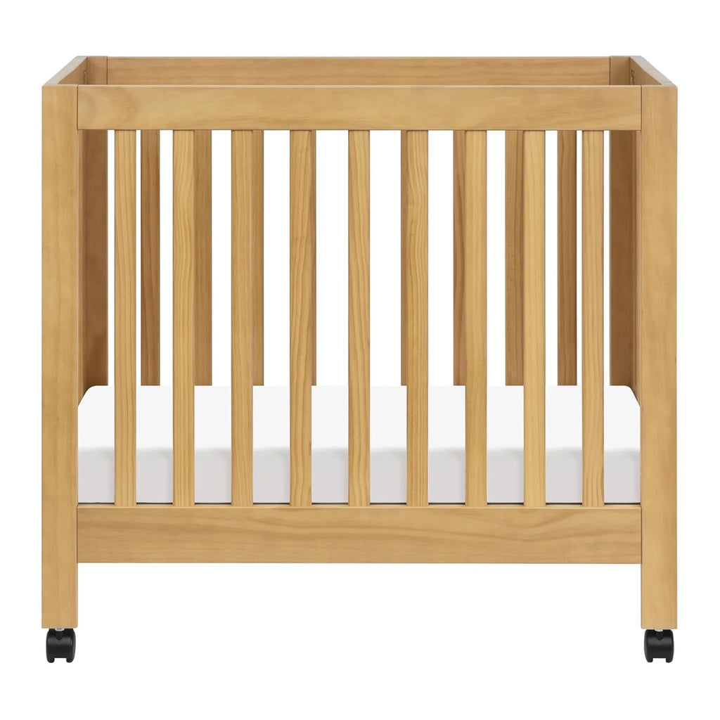 Babyletto Origami Mini Portable Crib Folding with Wheels in Honey, 2 Adjustable Mattress Positions, Greenguard Gold Certified